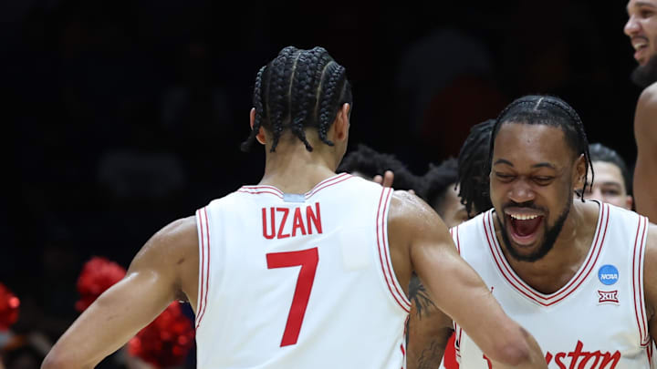 Mar 30, 2025; Indianapolis, IN, USA; Houston Cougars forward J'Wan Roberts (13) reacts with guard Milos Uzan (7) after the game against the Tennessee Volunteers in the Midwest Regional final of the 2025 NCAA tournament at Lucas Oil Stadium. Mandatory Credit: Trevor Ruszkowski-Imagn Images