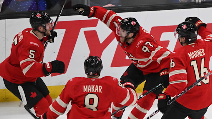 Feb 20, 2025; Boston, MA, USA; [Imagn Images direct customers only]  Team Canada forward Connor McDavid (97) celebrates scoring in overtime to win with defenseman Devon Toews (5) and defenseman Cale Makar (8) and forward Mitch Marner (16) against Team USA during the 4 Nations Face-Off ice hockey championship game at TD Garden. Mandatory Credit: Brian Fluharty-Imagn Images