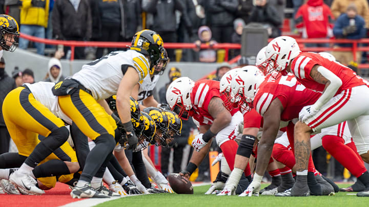 Nebraska center Justin Evans prepares to snap the ball against Iowa.