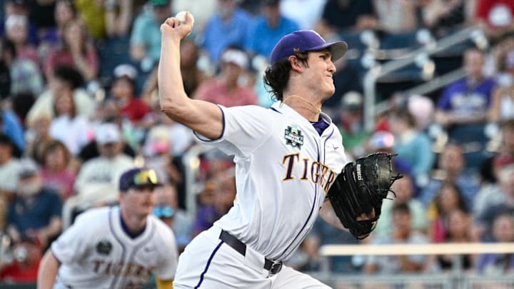 Jun 18, 2025; Omaha, Neb, USA;  LSU Tigers pitcher Chase Shores (34) throws against the Arkansas Razorbacks during the eighth inning at Charles Schwab Field. Mandatory Credit: Steven Branscombe-Imagn Images