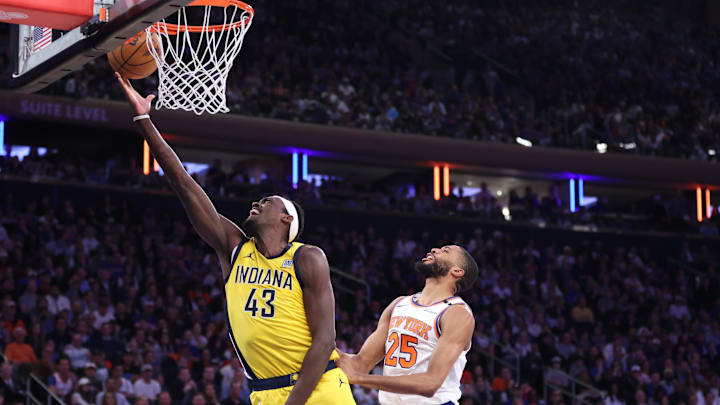 Pacers forward Siakam shoots while under pressure from Knicks forward Bridges during Game 2 of the Eastern Conference Finals.