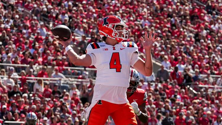 Illinois Fighting Illini quarterback Katin Houser (4) throws during the NCAA football game against the Ohio State Buckeyes at Ohio Stadium in Columbus on Sept. 26, 2026. Illinois Fighting Illini quarterback Katin Houser (4) throws during the NCAA football game against the Ohio State Buckeyes at Ohio Stadium in Columbus on Sept. 26, 2026.