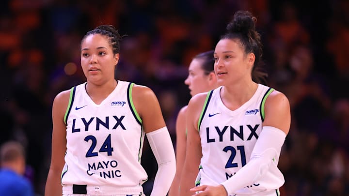 Jul 9, 2025; Phoenix, Arizona, USA; Minnesota Lynx forward Napheesa Collier (24) and guard Kayla McBride (21) against the Phoenix Mercury at PHX Arena. Mandatory Credit: Mark J. Rebilas-Imagn Images