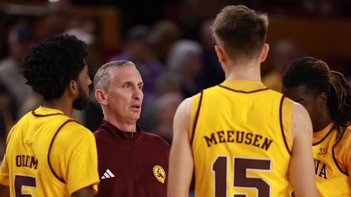 Jan 10, 2026; Tempe, Arizona, USA; Arizona State Sun Devils head coach Bobby Hurley in the huddle with his players against the Kansas State Wildcats in the first half at Desert Financial Arena. Mandatory Credit: Mark J. Rebilas-Imagn Images