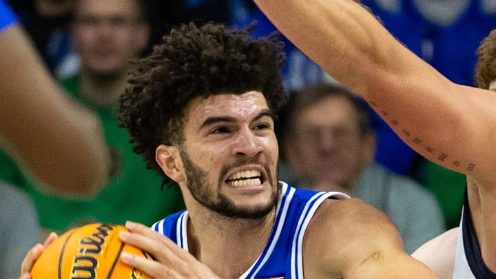 Feb 24, 2026; South Bend, Indiana, USA; Duke Blue Devils forward Cameron Boozer (12) works against Notre Dame Fighting Irish forward Carson Towt (33) during the first half at Purcell Pavilion at the Joyce Center. Mandatory Credit: Michael Caterina-Imagn Images Feb 24, 2026; South Bend, Indiana, USA; Duke Blue Devils forward Cameron Boozer (12) works against Notre Dame Fighting Irish forward Carson Towt (33) during the first half at Purcell Pavilion at the Joyce Center. Mandatory Credit: Michael Caterina-Imagn Images