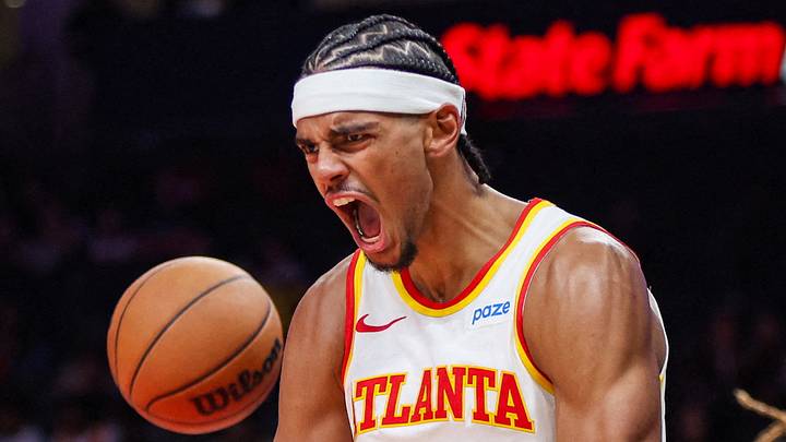 Atlanta Hawks forward Asa Newell (14) reacts after a dunk against the Memphis Grizzlies in the fourth quarter at State Farm Arena, Oct 5, 2026. Atlanta Hawks forward Asa Newell (14) reacts after a dunk against the Memphis Grizzlies in the fourth quarter at State Farm Arena, Oct 5, 2026.