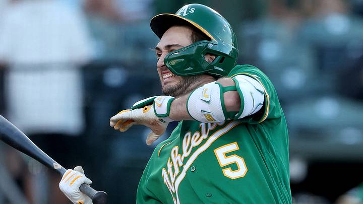 Aug 14, 2026; West Sacramento, California, USA; Athletics short stop Jacob Wilson (5) reacts after getting hit by a pitch thrown by Texas Rangers starting pitcher Kumar Rocker (not pictured) during the first inning at Sutter Health Park. Mandatory Credit: Dennis Lee-Imagn Images Aug 14, 2026; West Sacramento, California, USA; Athletics short stop Jacob Wilson (5) reacts after getting hit by a pitch thrown by Texas Rangers starting pitcher Kumar Rocker (not pictured) during the first inning at Sutter Health Park. Mandatory Credit: Dennis Lee-Imagn Images