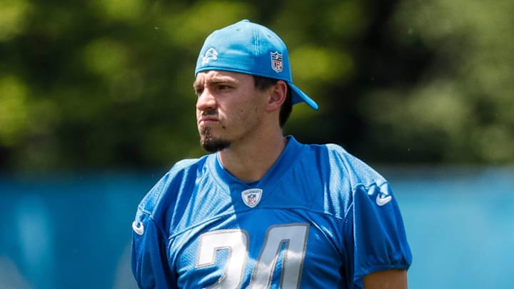 Detroit Lions place kicker John Parker Romo (24) watches practice during OTAs at Detroit Lions headquarters in Allen Park on Thursday, June 1, 2023.