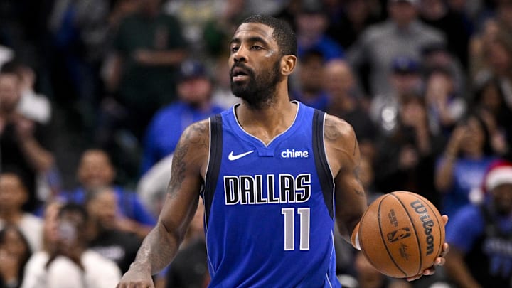Dec 25, 2024; Dallas, Texas, USA; Dallas Mavericks guard Kyrie Irving (11) brings the ball up court against the Minnesota Timberwolves during the second half at the American Airlines Center. Mandatory Credit: Jerome Miron-Imagn Images