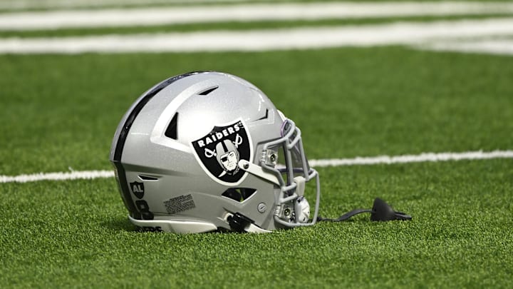 Oct 20, 2024; Inglewood, California, USA; Las Vegas Raiders helmet on the turn at SoFi Stadium during pregame warmups before an NFL game against the Los Angeles Rams. Mandatory Credit: Robert Hanashiro-Imagn Images
