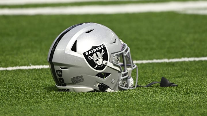 Oct 20, 2024; Inglewood, California, USA; Las Vegas Raiders helmet on the turn at SoFi Stadium during pregame warmups before an NFL game against the Los Angeles Rams. Mandatory Credit: Robert Hanashiro-Imagn Images