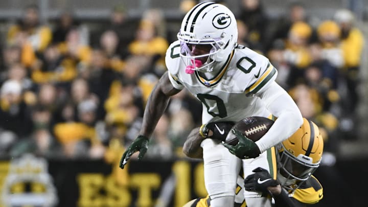 Oct 26, 2025; Pittsburgh, Pennsylvania, USA; Green Bay Packers wide receiver Matthew Golden is tackled by Pittsburgh Steelers cornerback Darius Slay (23) during the first quarter at Acrisure Stadium. Oct 26, 2025; Pittsburgh, Pennsylvania, USA; Green Bay Packers wide receiver Matthew Golden is tackled by Pittsburgh Steelers cornerback Darius Slay (23) during the first quarter at Acrisure Stadium.