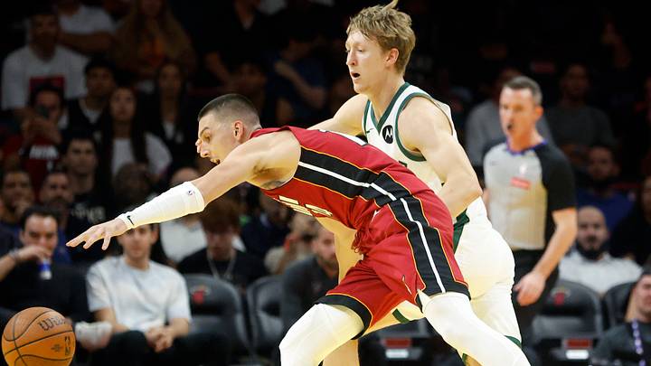 Nov 26, 2025; Miami, Florida, USA; Miami Heat guard Tyler Herro (14) and Milwaukee Bucks guard AJ Green (20) fight for a loose ball during the first half of an NBA Cup game at Kaseya Center. Mandatory Credit: Rhona Wise-Imagn Images Nov 26, 2025; Miami, Florida, USA; Miami Heat guard Tyler Herro (14) and Milwaukee Bucks guard AJ Green (20) fight for a loose ball during the first half of an NBA Cup game at Kaseya Center. Mandatory Credit: Rhona Wise-Imagn Images