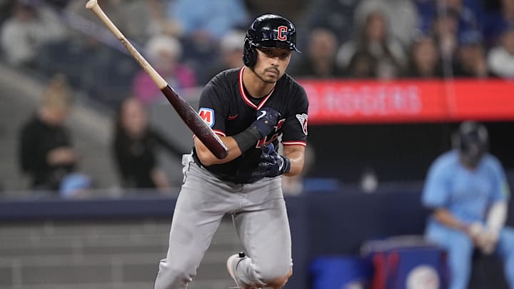 May 4, 2025; Toronto, Ontario, CAN; Cleveland Guardians left fielder Steven Kwan (38) tosses his bat as he is walked during the ninth inning against the Toronto Blue Jays at Rogers Centre. Mandatory Credit: John E. Sokolowski-Imagn Images