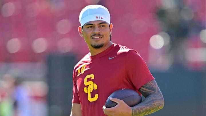Oct 11, 2025; Los Angeles, California, USA;  USC Trojans quarterback Jayden Maiava (14) warms up prior to the game against the Michigan Wolverines at United Airlines Field at the Los Angeles Memorial Coliseum. Mandatory Credit: Jayne Kamin-Oncea-Imagn Images