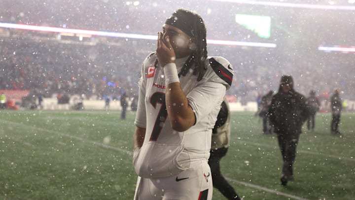 CJ Stroud walks off the field following a defeat at the hands of the New England Patriots