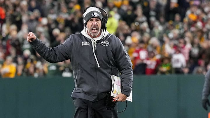 Nov 24, 2024; Green Bay, Wisconsin, USA; San Francisco 49ers head coach Kyle Shanahan argues with an official during the second quarter against the Green Bay Packers at Lambeau Field. Mandatory Credit: Jeff Hanisch-Imagn Images Nov 24, 2024; Green Bay, Wisconsin, USA; San Francisco 49ers head coach Kyle Shanahan argues with an official during the second quarter against the Green Bay Packers at Lambeau Field. Mandatory Credit: Jeff Hanisch-Imagn Images
