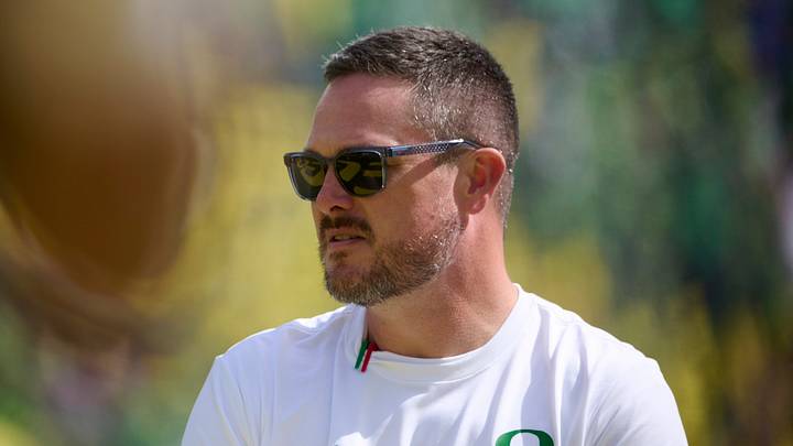 Sep 5, 2026; Eugene, Oregon, USA; Oregon Ducks head coach Dan Lanning encourages players during warm ups before a game against the Boise State Broncos at Autzen Stadium