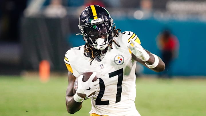 Aug 9, 2025; Jacksonville, Florida, USA; Pittsburgh Steelers running back Trey Sermon (27) carries the ball against the Jacksonville Jaguars during a preseason game at EverBank Stadium. Mandatory Credit: Travis Register-Imagn Images