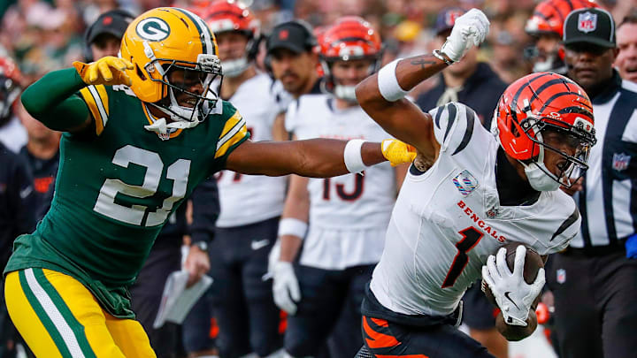 Green Bay Packers cornerback Nate Hobbs (21) forces Cincinnati Bengals wide receiver Ja'Marr Chase (1) out of bounds on Sunday, October 12, 2025, at Lambeau Field in Green Bay, Wis.