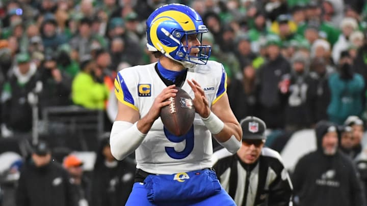 Jan 19, 2025; Philadelphia, Pennsylvania, USA; Los Angeles Rams quarterback Matthew Stafford (9) looks for a receiver against the Philadelphia Eagles in a 2025 NFC divisional round game at Lincoln Financial Field. Mandatory Credit: Eric Hartline-Imagn Images Jan 19, 2025; Philadelphia, Pennsylvania, USA; Los Angeles Rams quarterback Matthew Stafford (9) looks for a receiver against the Philadelphia Eagles in a 2025 NFC divisional round game at Lincoln Financial Field. Mandatory Credit: Eric Hartline-Imagn Images