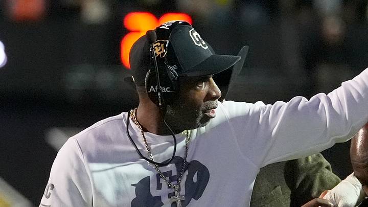 Oct 17, 2026; Boulder, Colorado, USA;  Colorado Buffaloes head coach Deion Sanders and offensive lineman Jayven Richardson (75) following an injury during the first quarter against the Utah Utes at Folsom Field.  Mandatory Credit: Ron Chenoy-Imagn Images