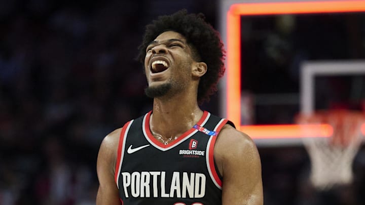 Feb 22, 2025; Portland, Oregon, USA; Portland Trail Blazers guard Scoot Henderson (00) reacts after missing a three point basket during the second half against the Charlotte Hornets at Moda Center. Mandatory Credit: Troy Wayrynen-Imagn Images