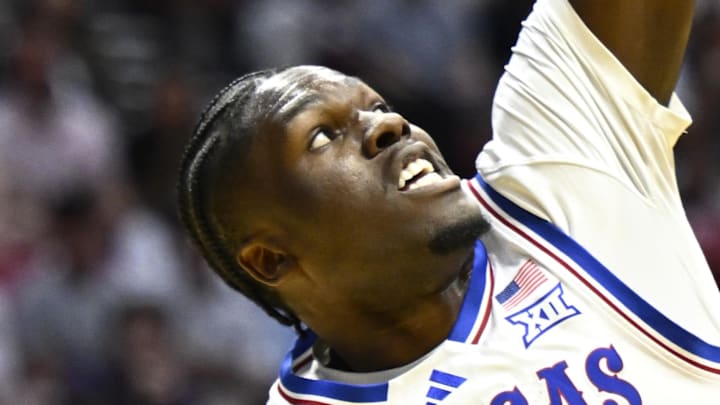 Mar 20, 2026; San Diego, CA, USA; California Baptist Lancers forward Thomas Ndong (25) shoots against Kansas Jayhawks forward Flory Bidunga (40) in the first half during a first round game of the men's 2026 NCAA Tournament at Viejas Arena. Mandatory Credit: Denis Poroy-Imagn Images