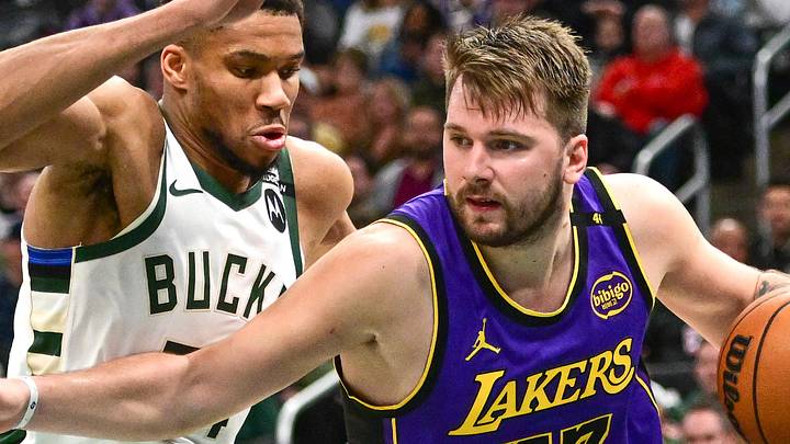 Mar 13, 2025; Milwaukee, Wisconsin, USA; Los Angeles Lakers guard Luka Doncic (77) drives to the basket against Milwaukee Bucks forward Giannis Antetokounmpo (34) in the third quarter at Fiserv Forum. Mandatory Credit: Benny Sieu-Imagn Images Mar 13, 2025; Milwaukee, Wisconsin, USA; Los Angeles Lakers guard Luka Doncic (77) drives to the basket against Milwaukee Bucks forward Giannis Antetokounmpo (34) in the third quarter at Fiserv Forum. Mandatory Credit: Benny Sieu-Imagn Images