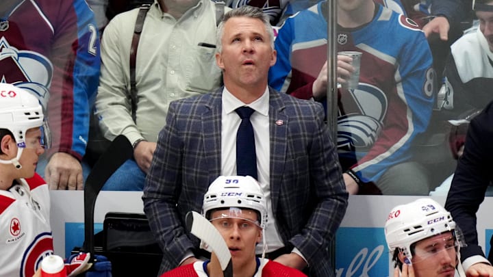 Mar 26, 2024; Denver, Colorado, USA; Montreal Canadiens head coach Martin St. Louis during the first period against the Colorado Avalanche at Ball Arena. Mandatory Credit: Ron Chenoy-Imagn Images
