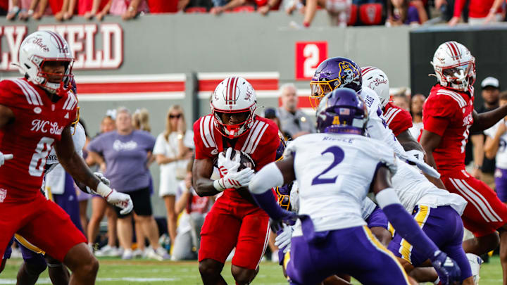 Aug 28, 2025; Raleigh, North Carolina, USA; North Carolina State Wolfpack quarterback CJ Bailey (11) runs with the ball during the first half of the game against East Carolina Pirates at Carter-Finley Stadium. Mandatory Credit: Jaylynn Nash-Imagn Images Aug 28, 2025; Raleigh, North Carolina, USA; North Carolina State Wolfpack quarterback CJ Bailey (11) runs with the ball during the first half of the game against East Carolina Pirates at Carter-Finley Stadium. Mandatory Credit: Jaylynn Nash-Imagn Images