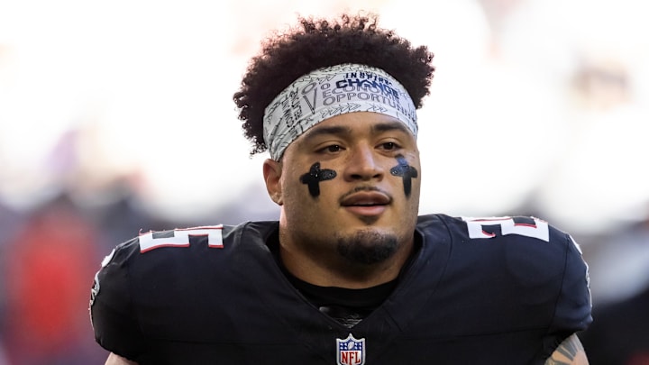 Dec 21, 2025; Glendale, Arizona, USA; Atlanta Falcons running back Tyler Allgeier (25) against the Arizona Cardinals at State Farm Stadium. Mandatory Credit: Mark J. Rebilas-Imagn Images