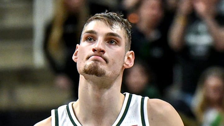 Michigan State's Carson Cooper, left, pumps his fist after time runs out in the Spartans win over Ohio State on Sunday, Feb. 22, 2026, at the Breslin Center in East Lansing.