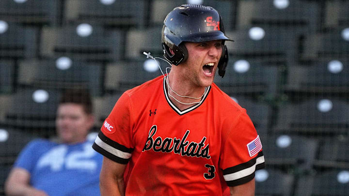 Walker Janek (3) celebrates his 3-run home run
