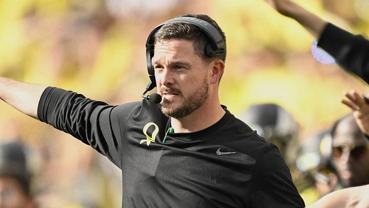 Oct 26, 2024; Eugene, Oregon, USA; Oregon Ducks head coach Dan Lanning signals to the defense during the second half against the Illinois Fighting Illini at Autzen Stadium. Mandatory Credit: Troy Wayrynen-Imagn Images