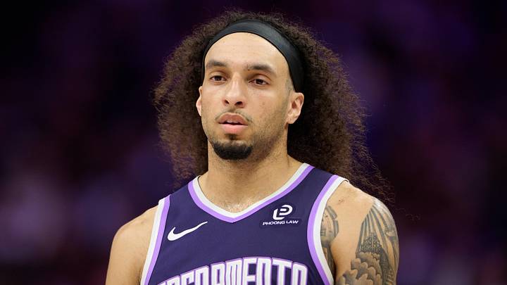 Apr 10, 2026; Sacramento, California, USA; Sacramento Kings guard Devin Carter (22) looks on after making a three point basket against the Golden State Warriors during the fourth quarter at Golden 1 Center. Mandatory Credit: Robert Edwards-Imagn Images
