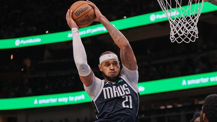 Nov 25, 2024; Atlanta, Georgia, USA; Dallas Mavericks center Daniel Gafford (21) grabs a rebound against the Atlanta Hawks in the third quarter at State Farm Arena. Mandatory Credit: Brett Davis-Imagn Images Nov 25, 2024; Atlanta, Georgia, USA; Dallas Mavericks center Daniel Gafford (21) grabs a rebound against the Atlanta Hawks in the third quarter at State Farm Arena. Mandatory Credit: Brett Davis-Imagn Images