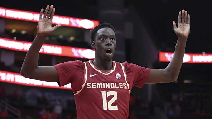 Dec 6, 2025; Houston, TX, USA; Florida State Seminoles forward Alier Maluk (12) reacts after a play during the first half against the Houston Cougars at Toyota Center. Mandatory Credit: Troy Taormina-Imagn Images