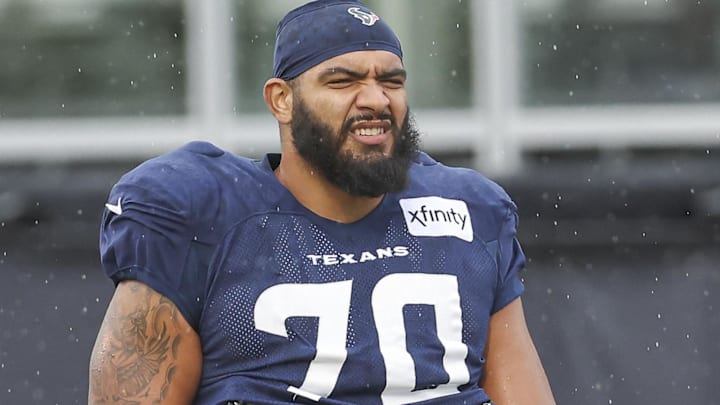 Houston Texans center Juice Scruggs (70) walks on the field at Houston Methodist Training Center.