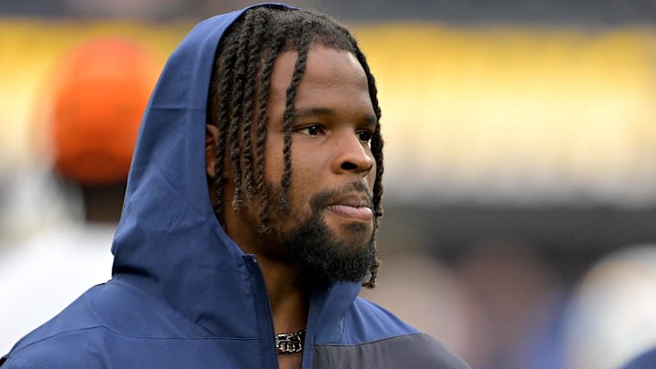 Sep 21, 2025; Inglewood, California, USA;  Denver Broncos linebacker Dre Greenlaw (57) on the sidelines prior to the game against the Los Angeles Chargers at SoFi Stadium. Mandatory Credit: Jayne Kamin-Oncea-Imagn Images