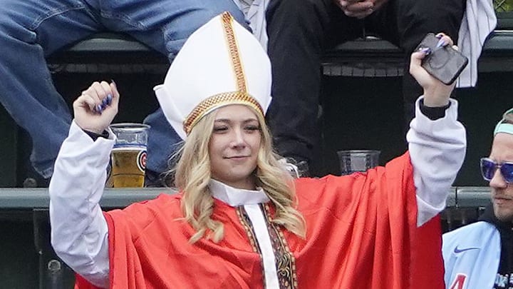May 18, 2025; Chicago, Illinois, USA; A person dressed in a Pope costume in the bleachers before the game between the Chicago Cubs and the Chicago White Sox at Wrigley Field. Mandatory Credit: David Banks-Imagn Images
