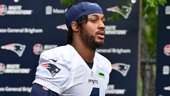 Jun 9, 2025; Foxborough, MA, USA; New England Patriots running back Antonio Gibson (4) walks to the practice fields at Gillette Stadium. Mandatory Credit: Eric Canha-Imagn Images