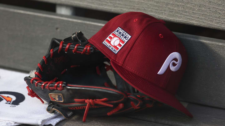 Jul 25, 2025; Bronx, New York, USA; A detailed view of a Hall of Fame patch on a Philadelphia Phillies hat resting in the dugout during the second inning against the New York Yankees at Yankee Stadium. 
