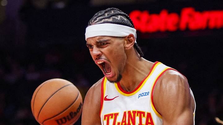 Oct 5, 2026; Atlanta, Georgia, USA; Atlanta Hawks forward Asa Newell (14) reacts after a dunk against the Memphis Grizzlies in the fourth quarter at State Farm Arena. Mandatory Credit: Brett Davis-Imagn Images     TPX IMAGES OF THE DAY