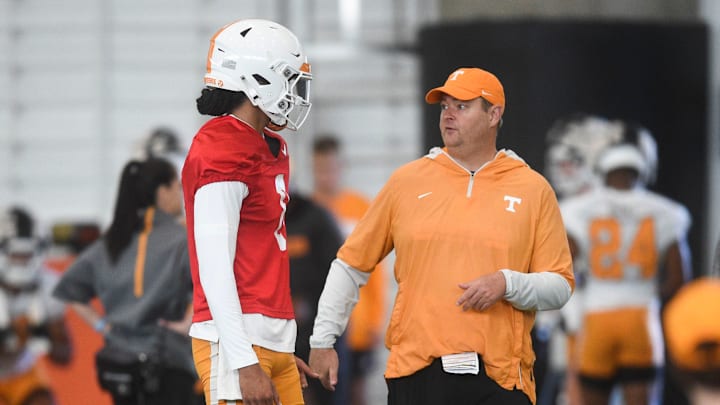 Tennessee’s Nico Iamaleava (8) and Tennessee head coach Josh Heupel during Tennessee football’s first fall practice, in Knoxville, Tenn., Wednesday, July 31, 2024.