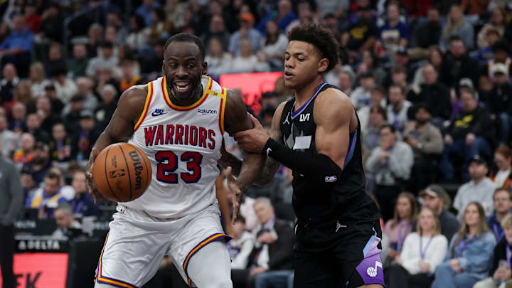 Feb 5, 2025; Salt Lake City, Utah, USA; Golden State Warriors forward Draymond Green (23) keeps the ball away from Utah Jazz guard Keyonte George (3) during the second half at Delta Center. Mandatory Credit: Chris Nicoll-Imagn Images Feb 5, 2025; Salt Lake City, Utah, USA; Golden State Warriors forward Draymond Green (23) keeps the ball away from Utah Jazz guard Keyonte George (3) during the second half at Delta Center. Mandatory Credit: Chris Nicoll-Imagn Images