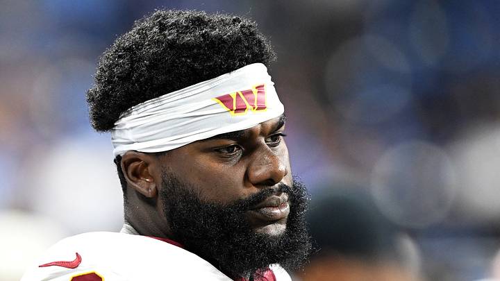 Former Washington Commanders defensive tackle Jeffrey M'ba (60) on the sidelines during their game against the Lions Former Washington Commanders defensive tackle Jeffrey M'ba (60) on the sidelines during their game against the Lions