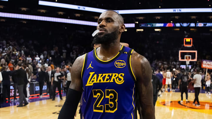 Oct 28, 2024; Phoenix, Arizona, USA; Los Angeles Lakers forward LeBron James (23) against the Phoenix Suns at Footprint Center. Mandatory Credit: Mark J. Rebilas-Imagn Images