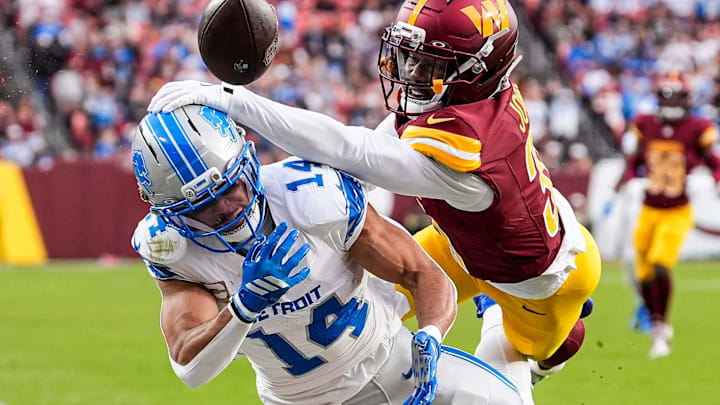 Washington Commanders cornerback Jonathan Jones (31) blocks a pass intended for Detroit Lions Amon-Ra St. Brown (14) Washington Commanders cornerback Jonathan Jones (31) blocks a pass intended for Detroit Lions Amon-Ra St. Brown (14)