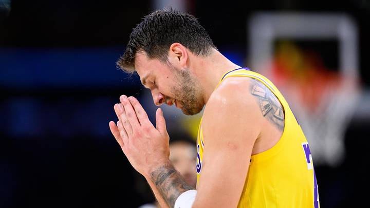 Mar 14, 2026; Los Angeles, California, USA; Los Angeles Lakers guard Luka Doncic (77) reacts after missing a shot during the first half against the Denver Nuggets at Crypto.com Arena. Mandatory Credit: William Liang-Imagn Images